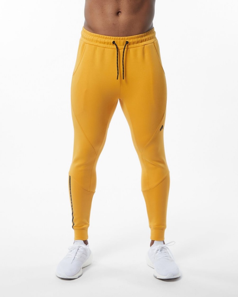 Men\'s Alphalete ELMTS Cuffed Jogger Jogger Yellow | 1029-ZYMUQ