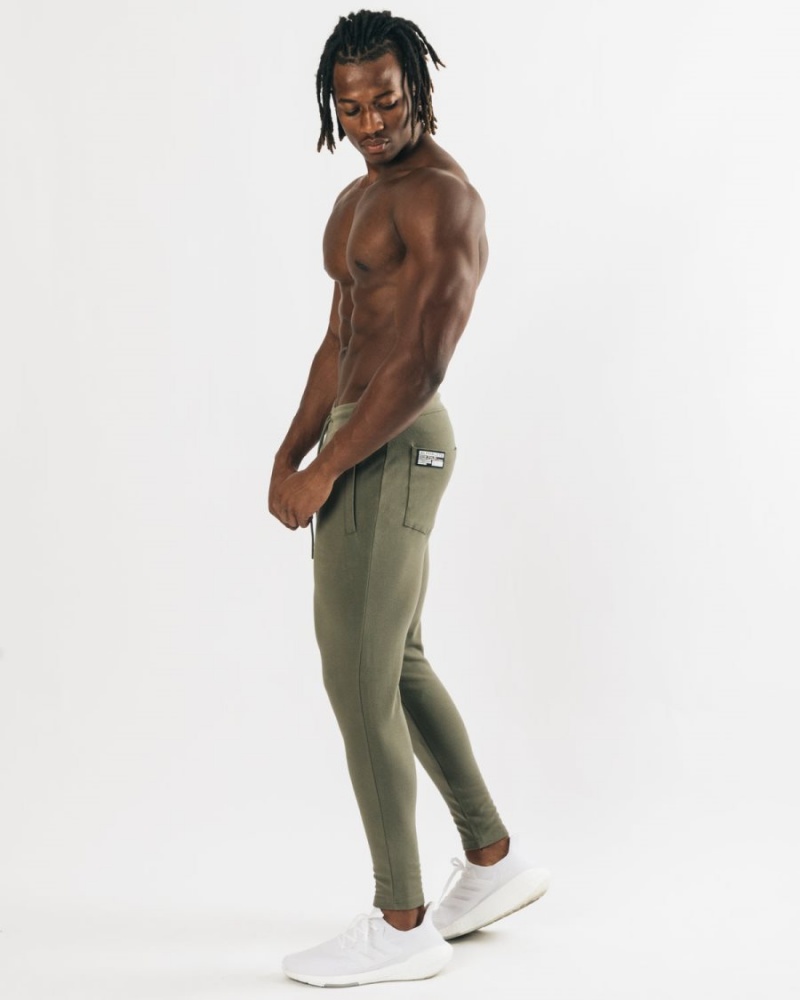 Men's Alphalete Identity Jogger Jogger Light Olive | 1073-RWYHS