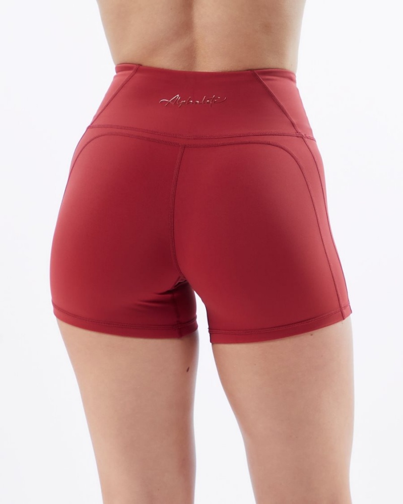 Women's Alphalete Pulse Surge Short 4" Shorts Tartan Red | 1940-CXHIM